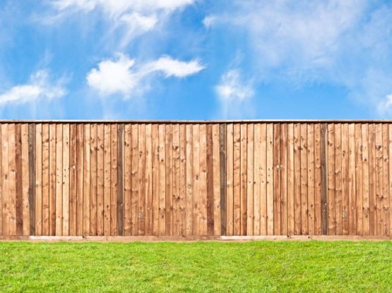 Timber Fence installed in a backyard on grass